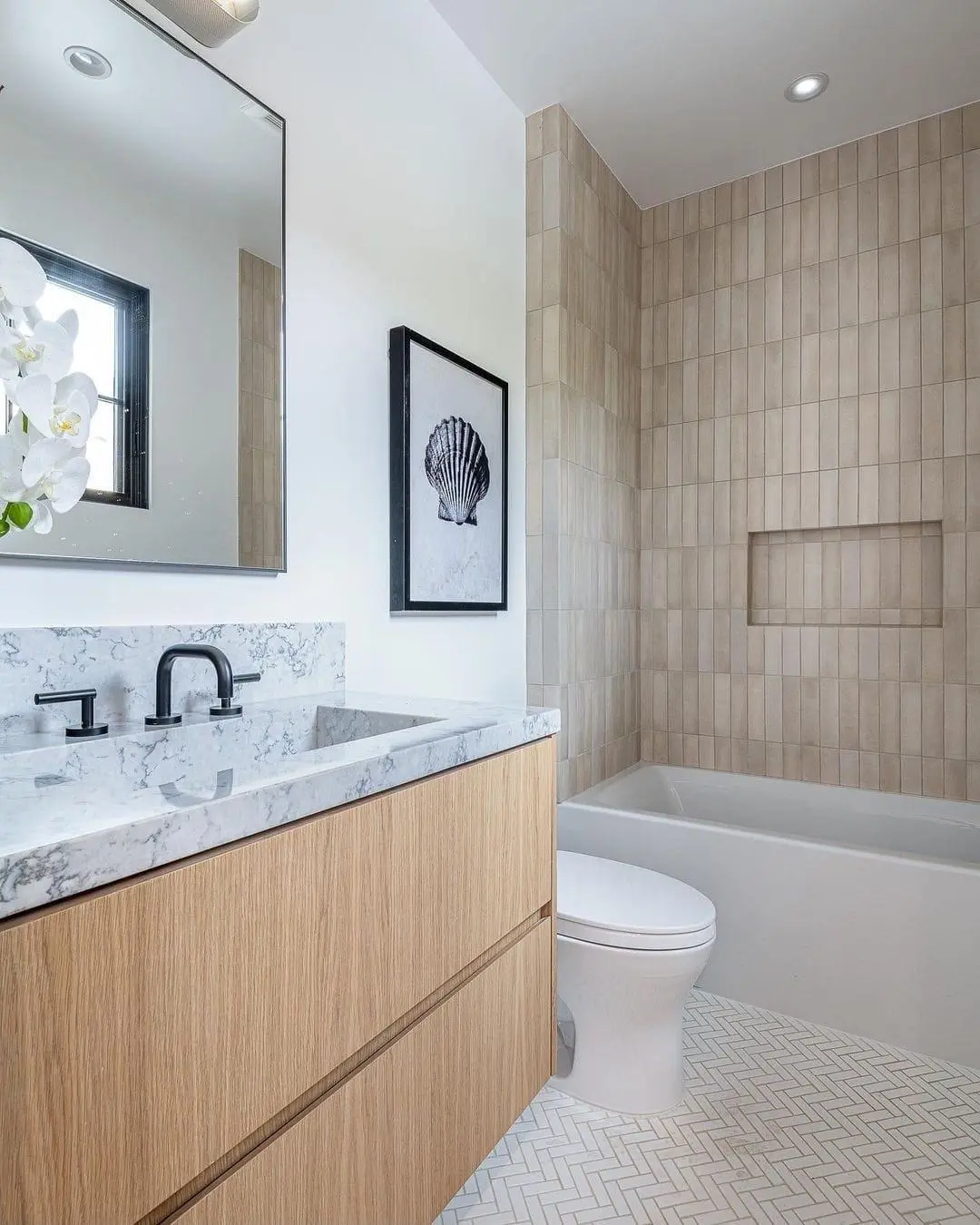 Bathroom Renovations showcasing high-end bathtubs and contemporary design by BelRed Construction