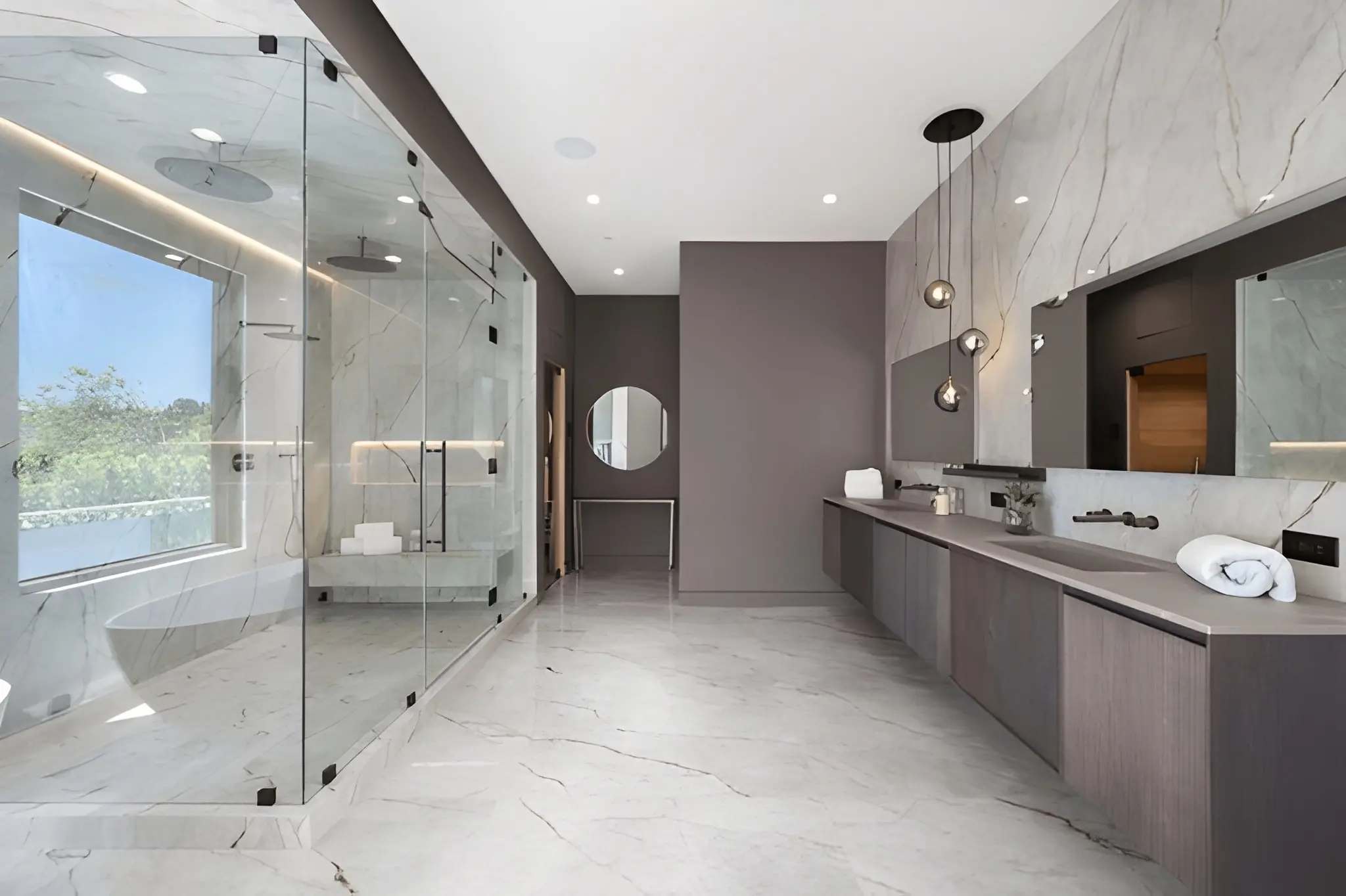 Luxury bathroom remodeling beaux arts village featuring spa-style shower and high-end finishes